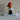 Minifig fab8b - Fabuland Monkey - Mike Monkey (Chauffeur), Brown Head, Blue Tie, Red Hat